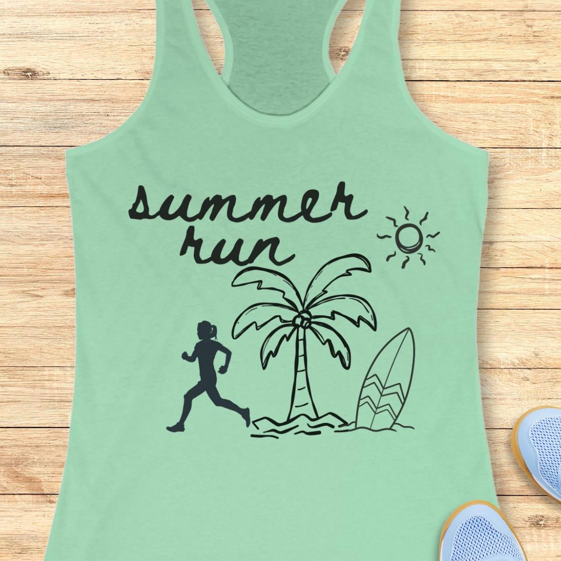 A mint green racerback tank top with a black 'summer run' graphic featuring a running silhouette, palm tree, surfboard, and sun, displayed flat on a light wood background.