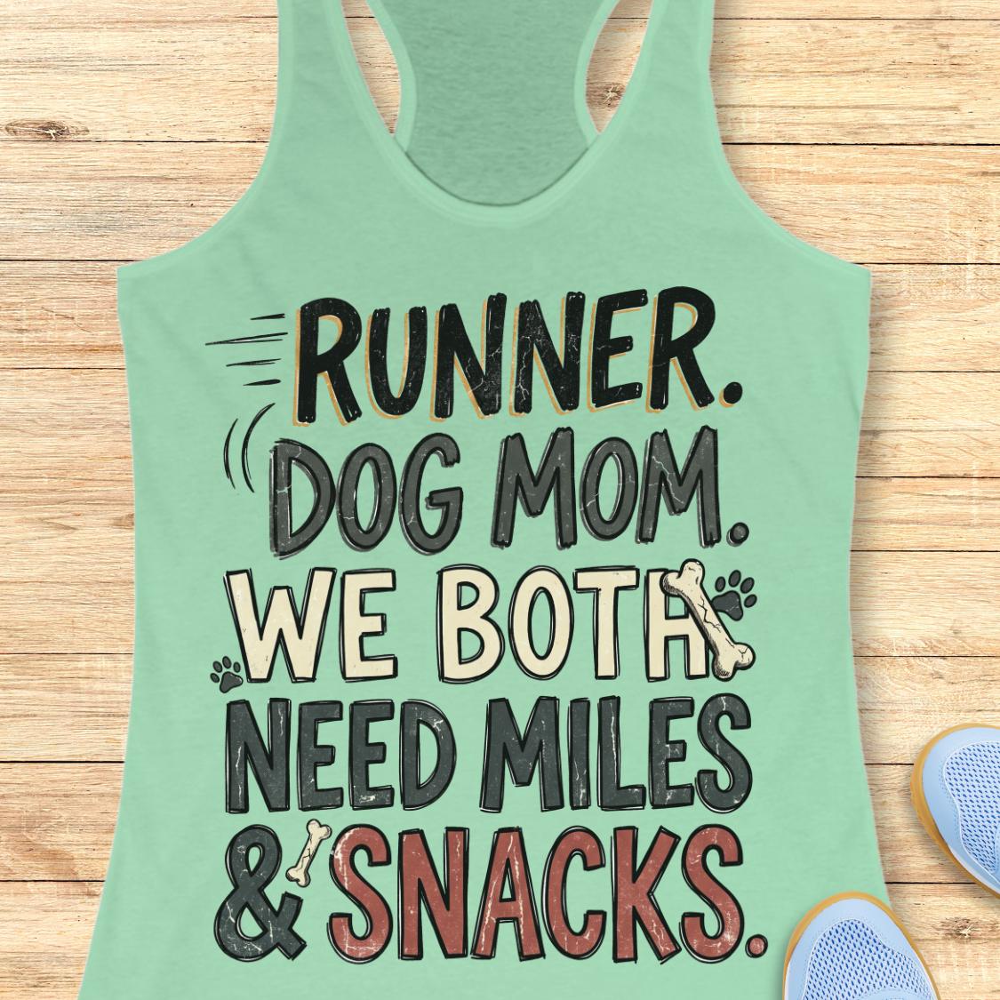 A mint green racerback tank top with a humorous graphic reading 'RUNNER. DOG MOM.