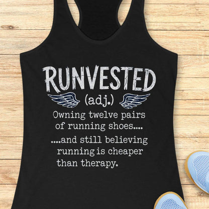 A black racerback tank top with a white graphic text print reading 'RUNVESTED (adj.) Owning twelve pairs of running shoes.