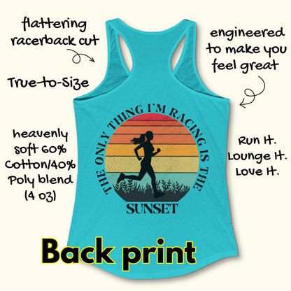 A turquoise racerback tank top shown on a cream background with handwritten marketing text around it. The back of the shirt features a large printed graphic of a running silhouette over a sunset gradient and the words 'THE ONLY THING I'M RACING IS THE SUNSET.