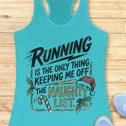 blue racerback tank top displayed on a light wooden surface, featuring a festive running-themed typography design. The graphic displays the humorous text: “RUNNING IS THE ONLY THING KEEPING ME OFF THE NAUGHTY LIST.” Holiday decorations include a red Santa hat, holly sprigs with red berries, a striped candy cane, and accent graphics surrounding the text. The words “NAUGHTY LIST” are highlighted in gold, while the remaining text appears in black. Partial blue athletic shoes are visible in the lower corn
