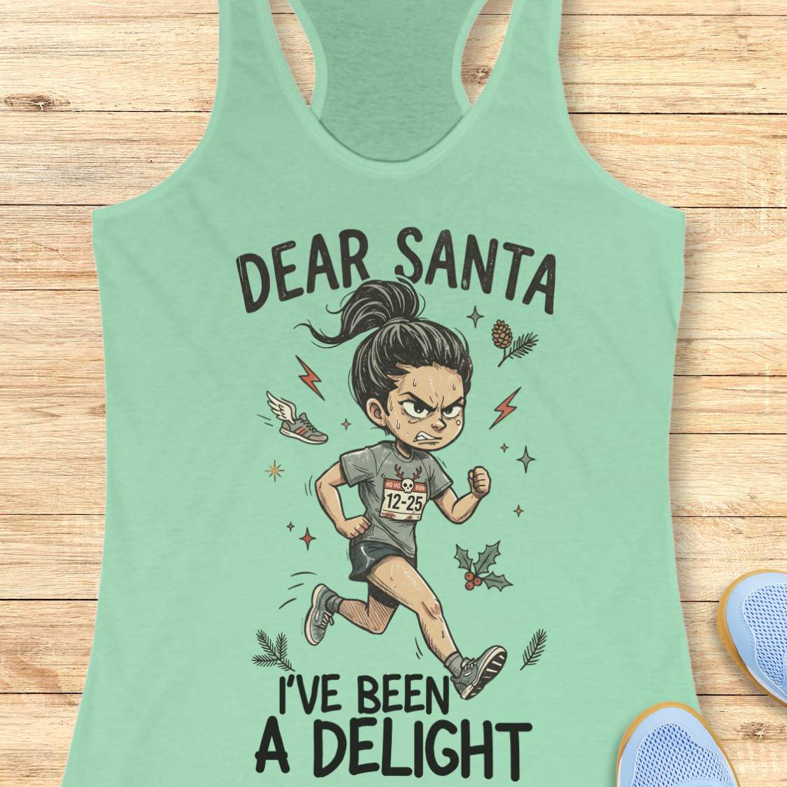 Mint green racerback tank top featuring the humorous Christmas running phrase “DEAR SANTA I’VE BEEN A DELIGHT” in bold black lettering. The design includes a cartoon runner wearing a race bib marked “12-25,” surrounded by holiday accents such as holly leaves, pine sprigs, stars, and a winged running shoe. The festive artwork combines runner humor with Christmas cheer. The tank top is displayed on a light wood background with partial blue running shoes visible in the corners.