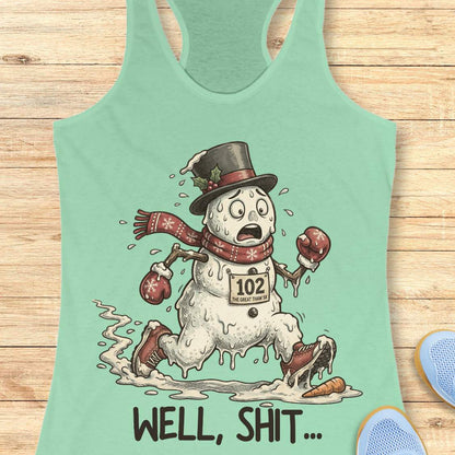 Funny Christmas running tank top featuring a melting snowman runner wearing red running shoes, boxing gloves, a scarf, and a top hat. The snowman has a race bib labeled "102 The Great Thaw 5K" and is shown melting while running through puddles, with a carrot nose fallen on the ground ahead. Large text below reads, "WELL, SHIT..." The design is printed on a heather gray racerback tank top and combines holiday humor with runner frustration.