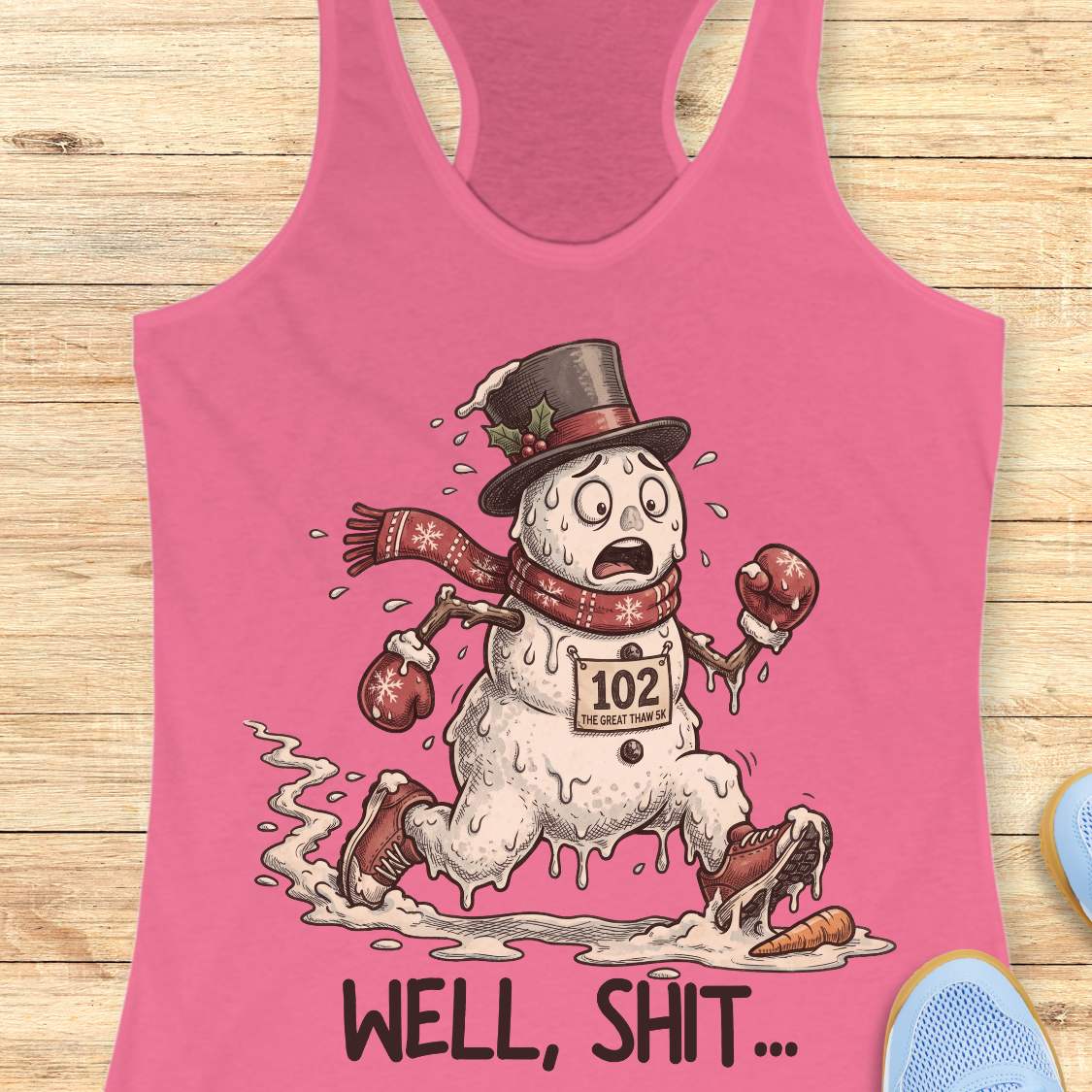 Funny Christmas running pink tank top featuring a melting snowman runner wearing red running shoes, boxing gloves, a scarf, and a top hat. The snowman has a race bib labeled "102 The Great Thaw 5K" and is shown melting while running through puddles, with a carrot nose fallen on the ground ahead. Large text below reads, "WELL, SHIT..." The design is printed on a heather gray racerback tank top and combines holiday humor with runner frustration.