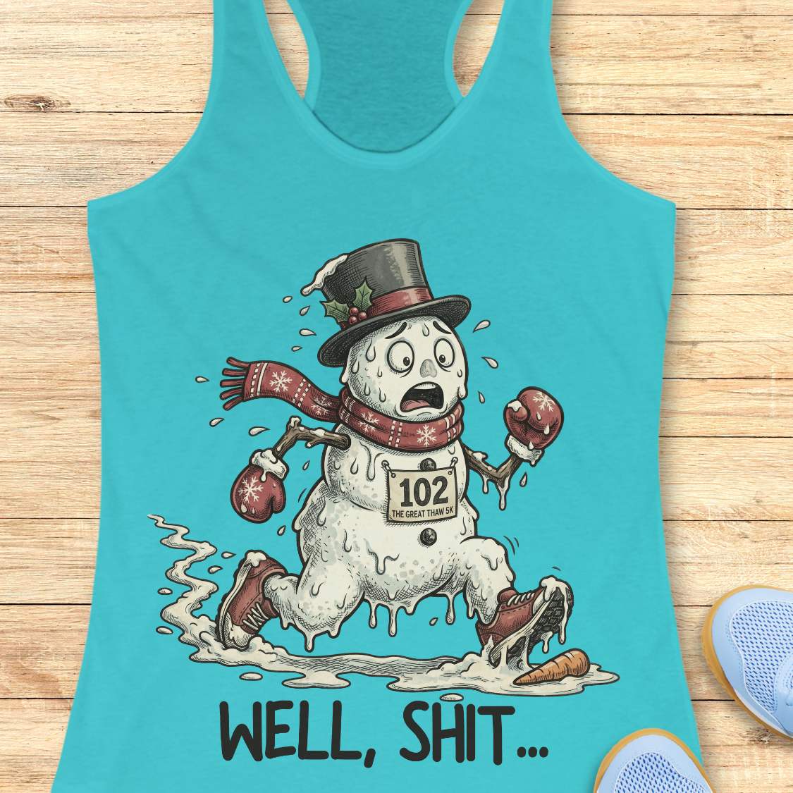 Funny Christmas running blue tank top featuring a melting snowman runner wearing red running shoes, boxing gloves, a scarf, and a top hat. The snowman has a race bib labeled "102 The Great Thaw 5K" and is shown melting while running through puddles, with a carrot nose fallen on the ground ahead. Large text below reads, "WELL, SHIT..." The design is printed on a heather gray racerback tank top and combines holiday humor with runner frustration.