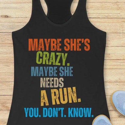 a video of a black tank top with the text - maybe she;s crazy. Maybe she needs a run. You. Don't. Know. the words are moving around 