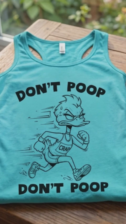 A video of a Teal blue graphic tank top featuring an angry cartoon duck wearing a "CRAP" bib and running, with "DON'T POOP" text repeated, on a light wood ftable